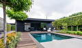 Tuin Assen met poolhouse en natuurzwembad